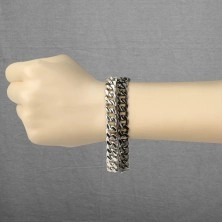 Massives Armband aus Stahl - zwei Ketten, schwarz-silberner Farbton