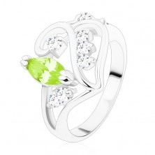 Glänzender Ring, Ornament mit geschliffenem grünlich gelbem Korn