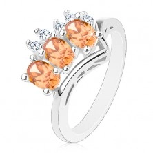 Ring in silberner Farbe, orangenfarbene Ovale, runde klare Zirkone