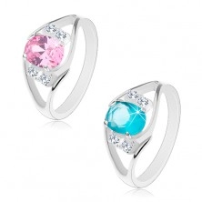 Glänzender Ring mit geteilter Ringschiene, farbiges Oval, klare Zirkoniasteine