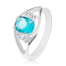 Glänzender Ring mit geteilter Ringschiene, farbiges Oval, klare Zirkoniasteine