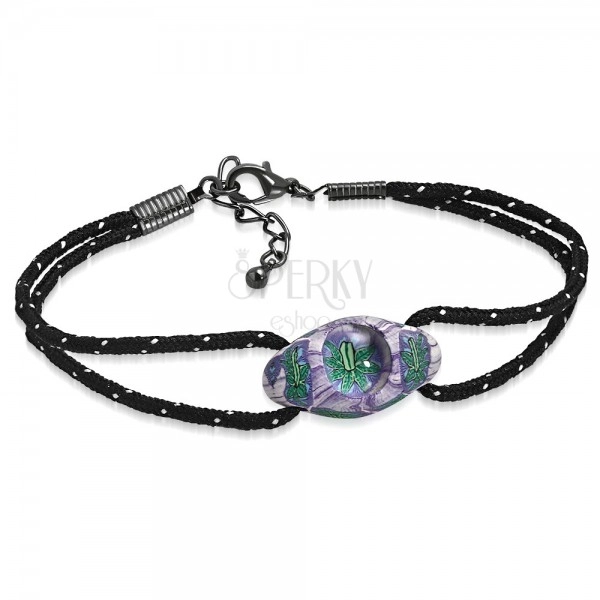 Schwarzes Schnur-Armband mit einer ovalen FIMO Perle, lila-grüne Blumen