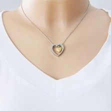 Edelstahl Halskette, goldenes Herz in einem Herzumriss