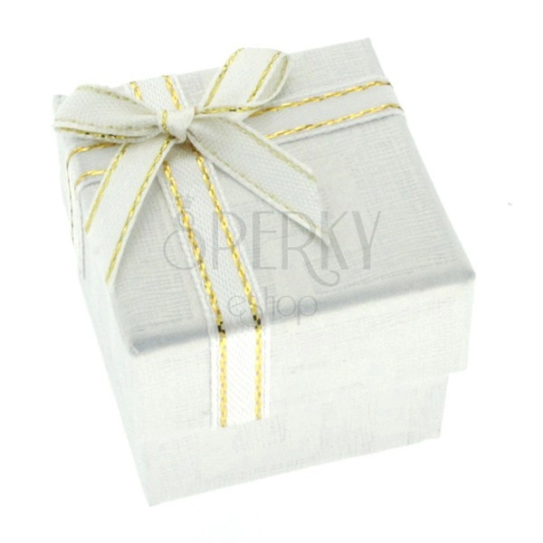 Weiße Geschenkverpackung mit griechischem Muster und Band